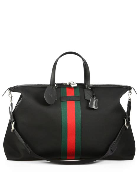 gucci duffle bag colors|Gucci black canvas duffle bag.